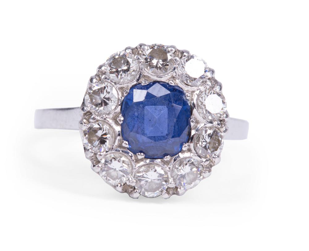 Appraisal: PLATINUM DIAMOND AND SAPPHIRE RINGPlatinum Diamond and Sapphire Ring center