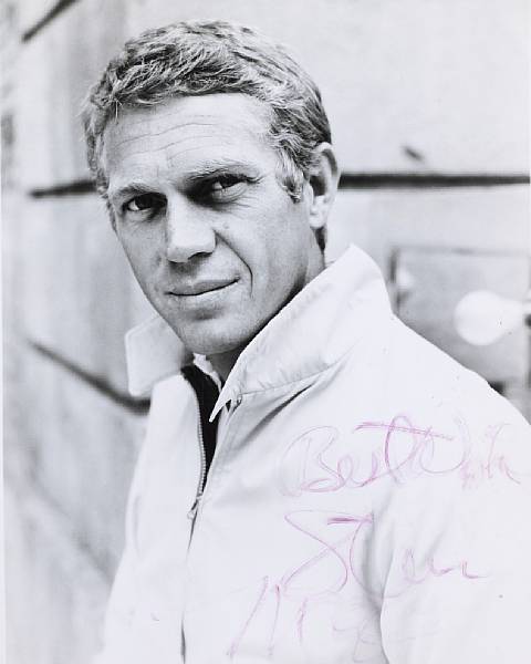 Appraisal: Two signed photographs of Steve McQueen both measuring x in