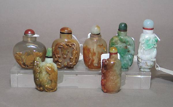 Appraisal: A group of seven snuff bottles Four of mottled jadeite