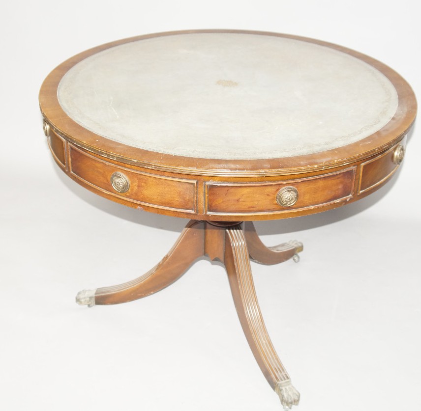 Appraisal: A reproduction mahogany Regency style drum head table with circular