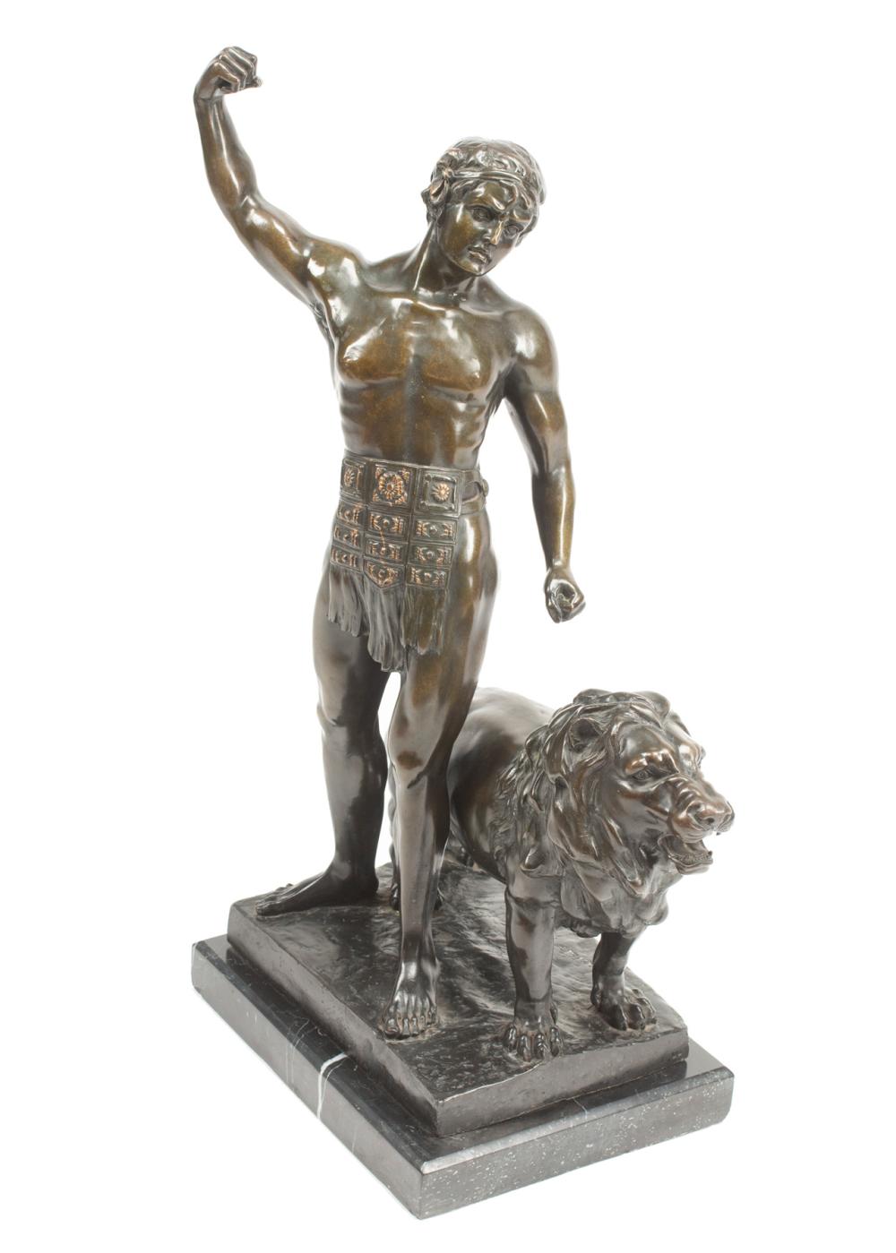 Appraisal: Patinated Bronze Figural Group of a Gladiator and Lion after