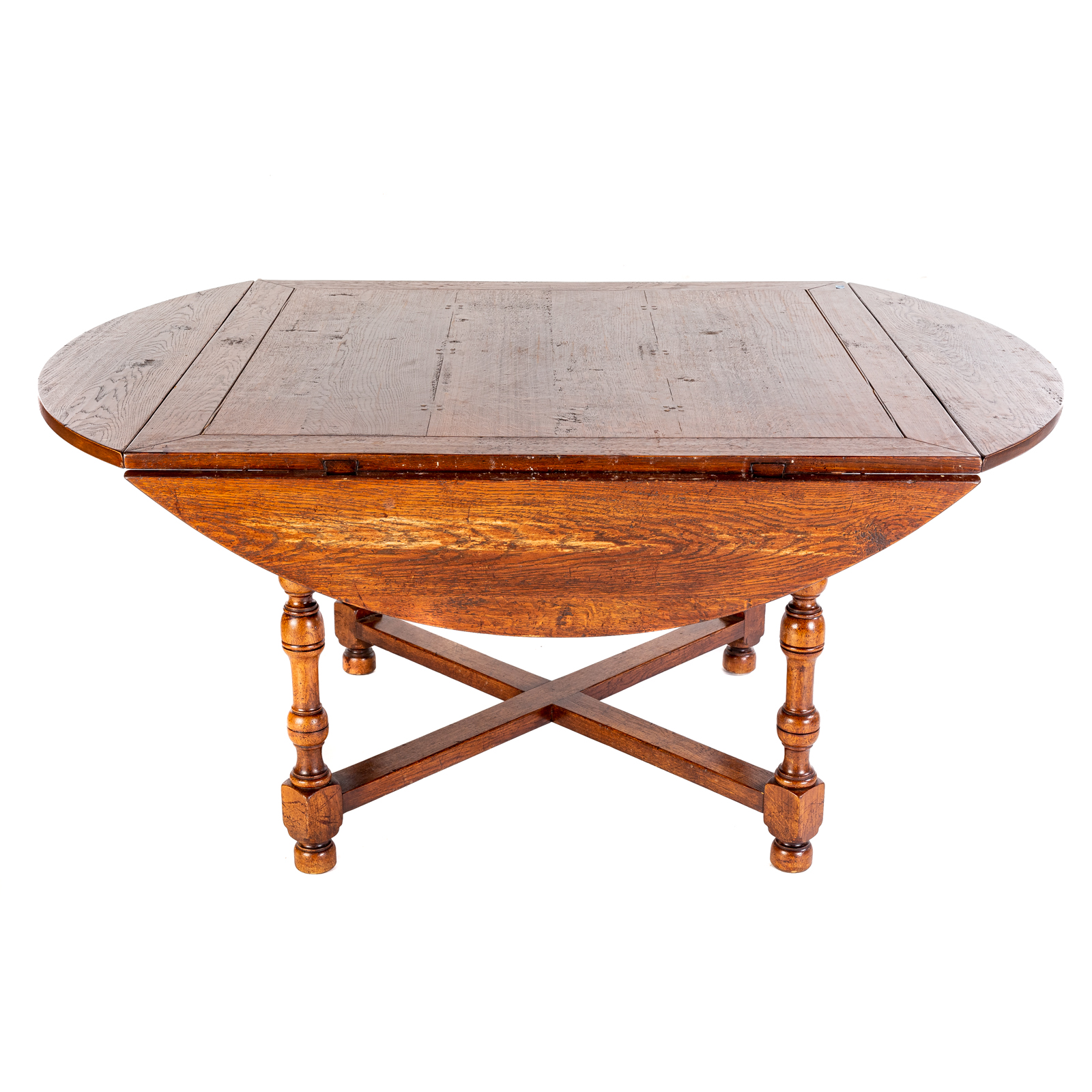 Appraisal: OAK DISTRESSED DROP-LEAF DINING TABLE th century rustic oak four-sided