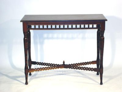 Appraisal: A Moorish walnut side table slender rectangular top with turned