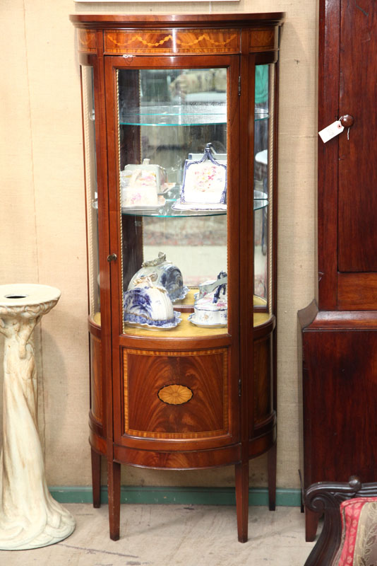 Appraisal: CURIO CABINET Mahogany having a step molded cornice crossbanded panels