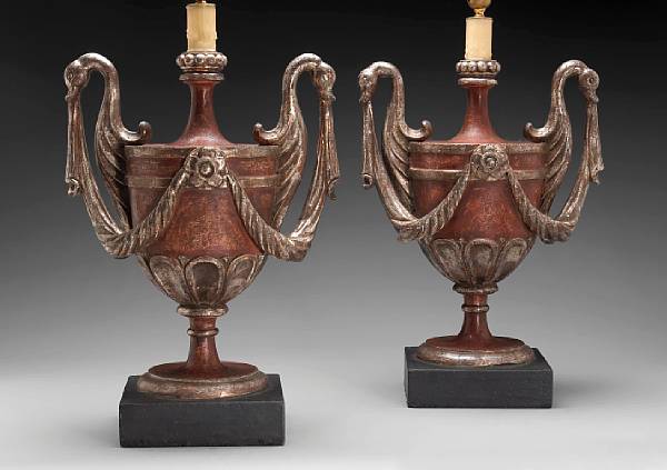 Appraisal: A pair of Italian Neoclassical style polychrome and silvered wood