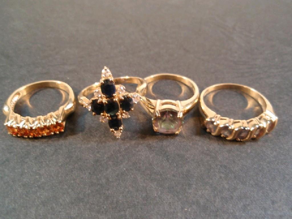 Appraisal: Four stone set dress rings in ct gold maker GTV