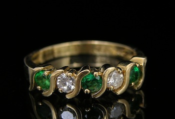 Appraisal: Emerald and Diamond Gold Band k yellow gold band set