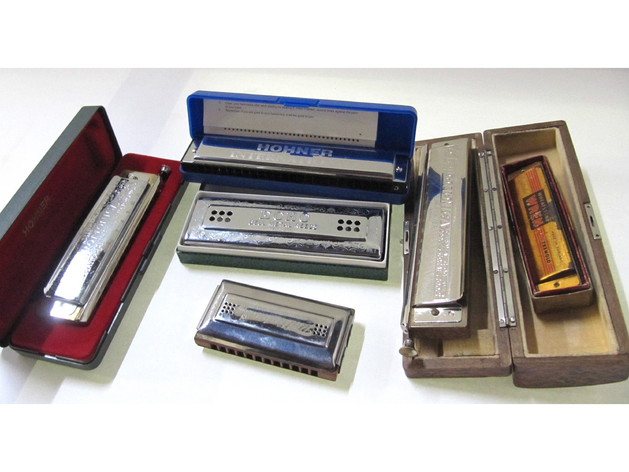 Appraisal: A lot comprising six assorted harmonicas