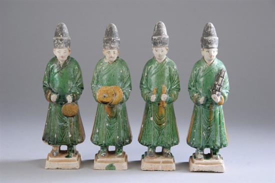 Appraisal: FOUR CHINESE SANCAI POTTERY FIGURES OF MUSICIANS Ming Dynasty Standing