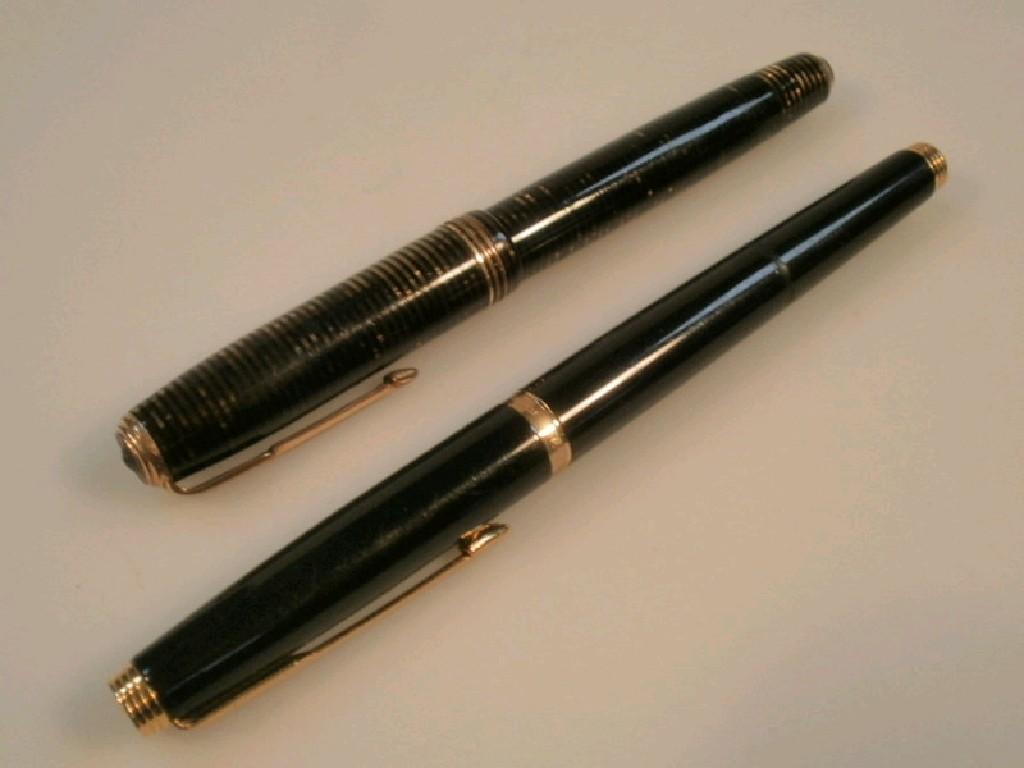 Appraisal: A vintage Parker fountain pen marked 'Parker Canada' and a