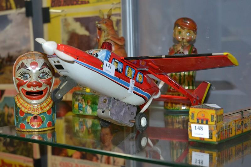 Appraisal: COLLECTION OF TINPLATE INCLUDING YANOMAN GLIDER MODERN TOYS KANGAROO MONKEY