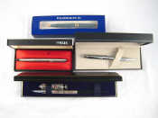 Appraisal: Four pens a stainless steel Parker with hooded nib a