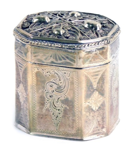 Appraisal: A silver miniature tea canister with filigree and acorn design