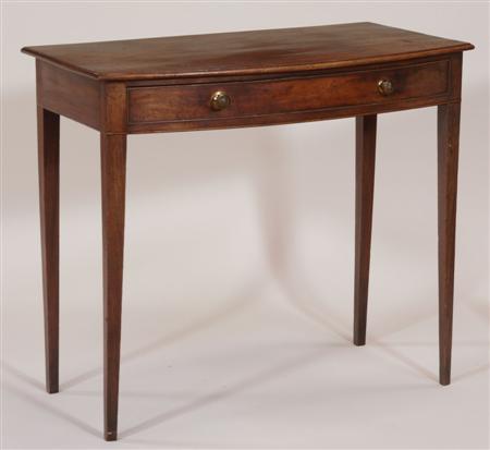 Appraisal: A Regency mahogany bowfront side table the moulded top over