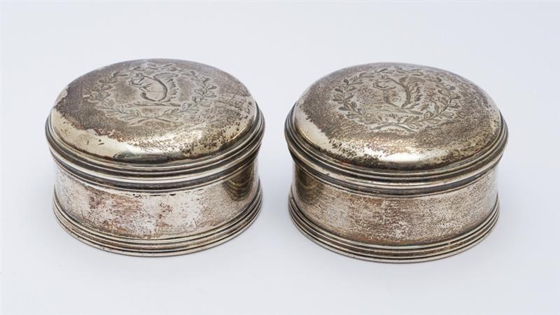 Appraisal: PAIR OF GEORGE III SILVER CIRCULAR POWDER BOXES PHIPPS AND