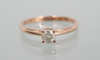 Appraisal: A Ladies' Diamond Solitaire Ring k rose gold filigree ring