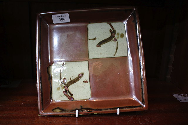 Appraisal: A STUDIO POTTERY SQUARE DISH decorated in ash glaze cm