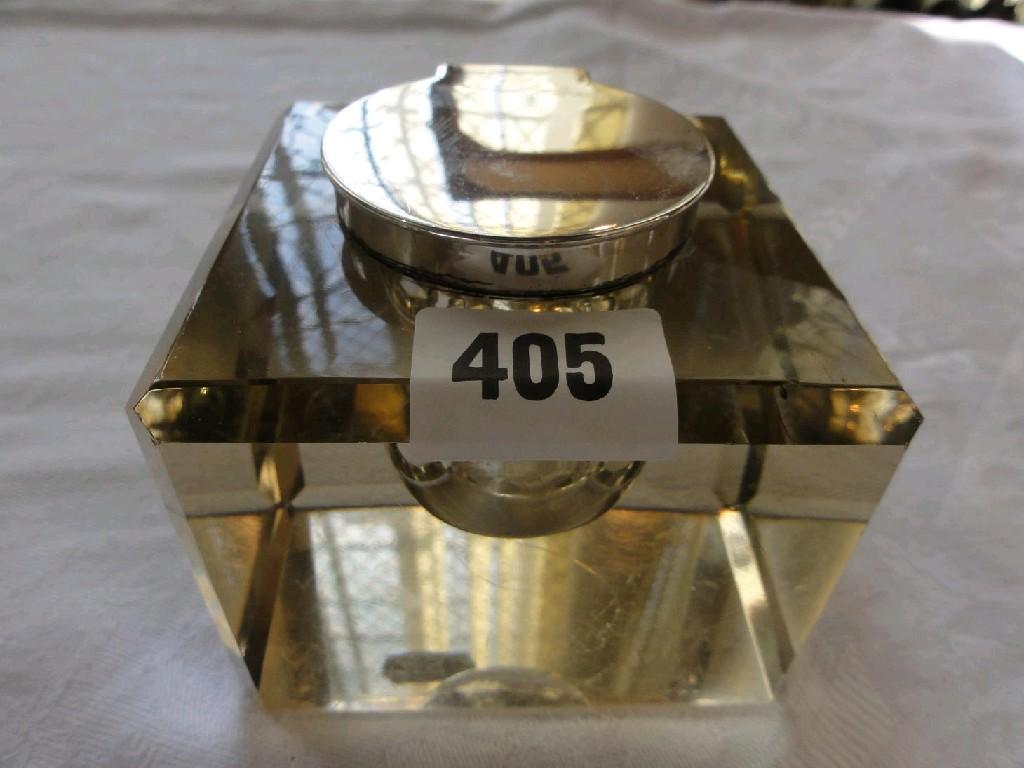 Appraisal: A heavy glass inkwell of square cut form with silver