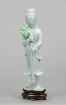 Appraisal: A Finely Carved Jadeite Figurine of Quan Yin Chinese A