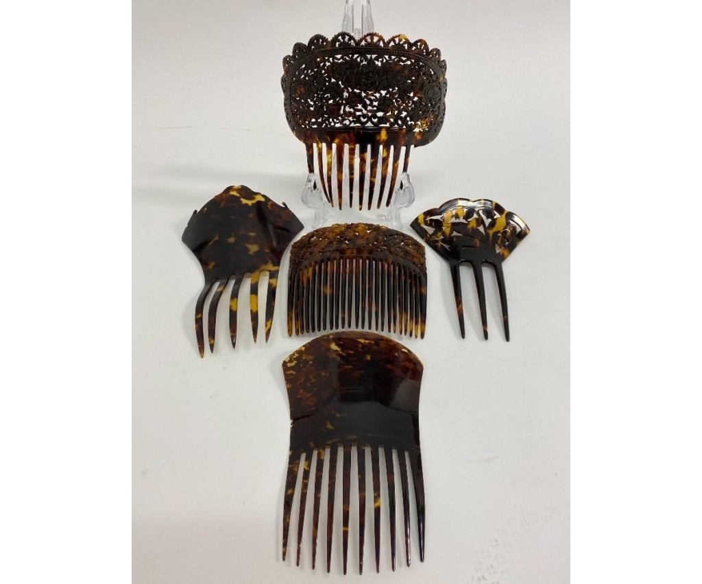 Appraisal: Five faux tortoise celluloid hair combs of varying designs and