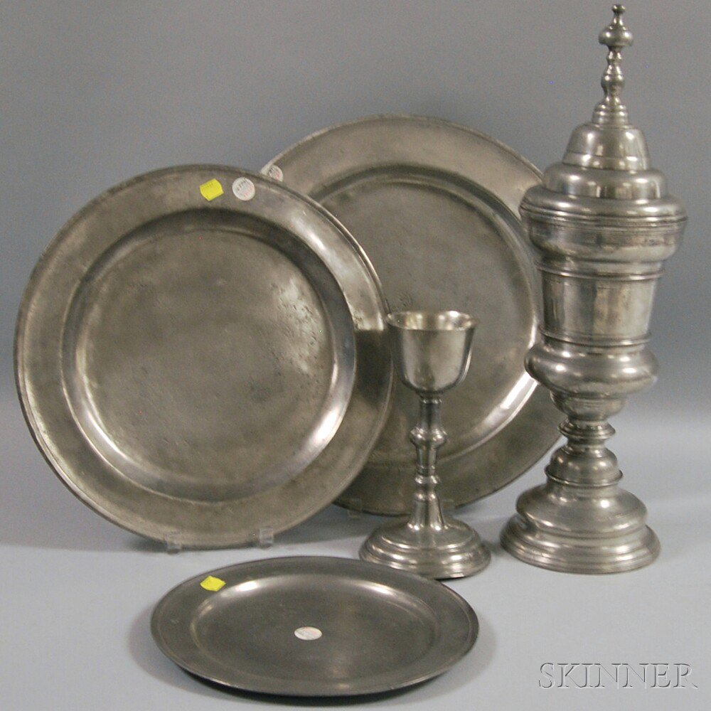 Appraisal: Two Pewter Chalices and Three Chargers one chalice with lid