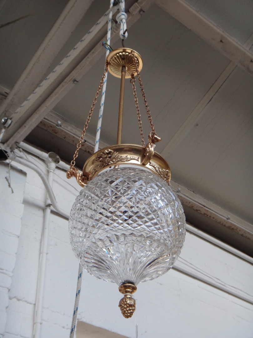 Appraisal: A gilt brass and cut glass ceiling light th century