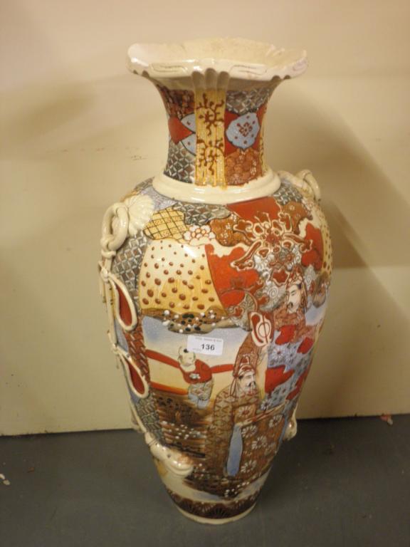 Appraisal: A large Japanese earthenware vase painted with figures within a