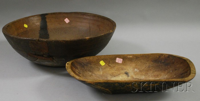 Appraisal: Two Black-painted Wooden Bowls America th century a round turned