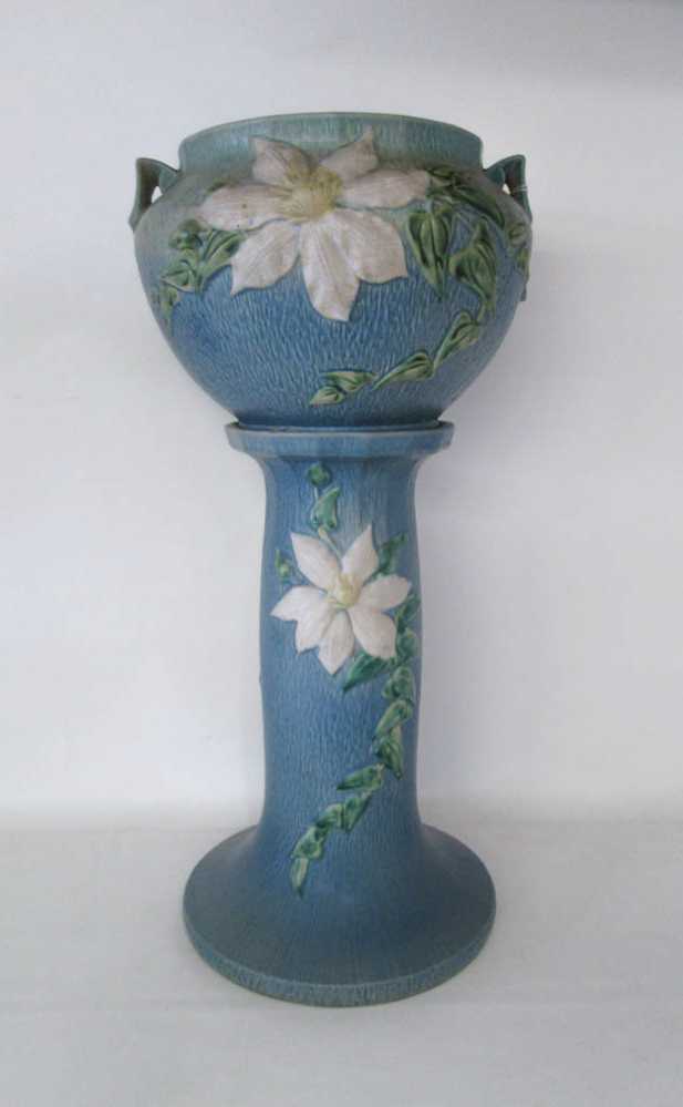 Appraisal: ROSEVILLE JARDINIERE AND PEDESTAL BASE in the Clematis pattern blue