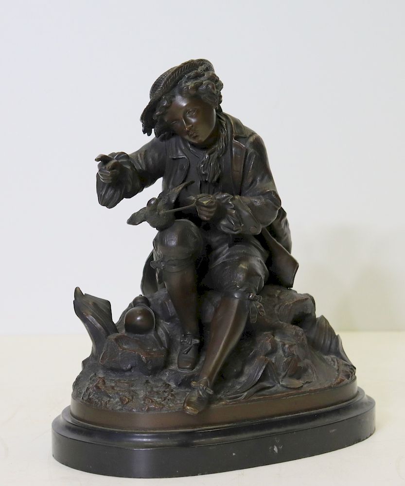 Appraisal: UNSIGNED Bronze Sculpture Of A Boy With Pigeon Nicely executed