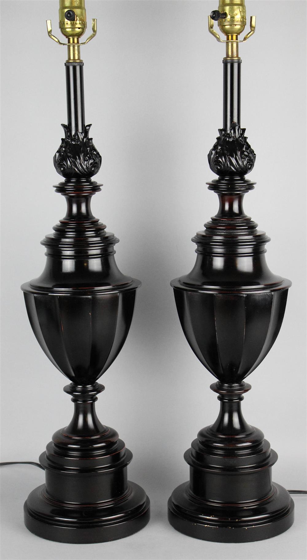 Appraisal: PAIR OF BLACK-BROWN PAINTED METAL URN SHAPED LAMPS ESTATE OF