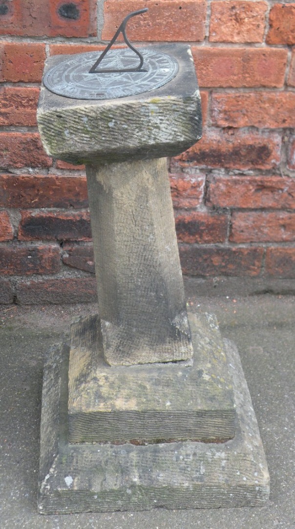 Appraisal: A thC reconstituted stone sundial the square plinth top with