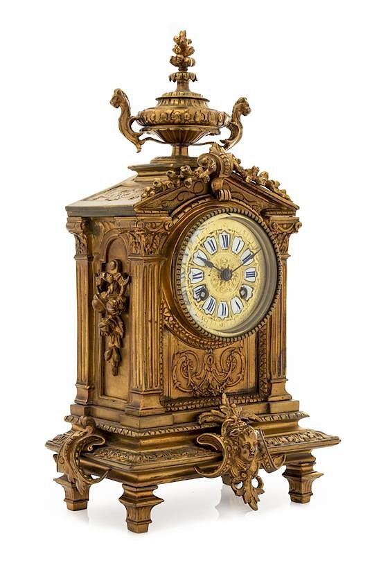 Appraisal: A French Neoclassical Brass Mantel Clock Height x width x