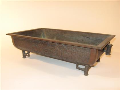 Appraisal: Japanese bronze jardiniereOf rectangular form over four bracket legs