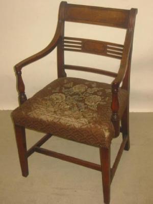 Appraisal: A GEORGE III MAHOGANY ELBOW CHAIR of Sheraton type with