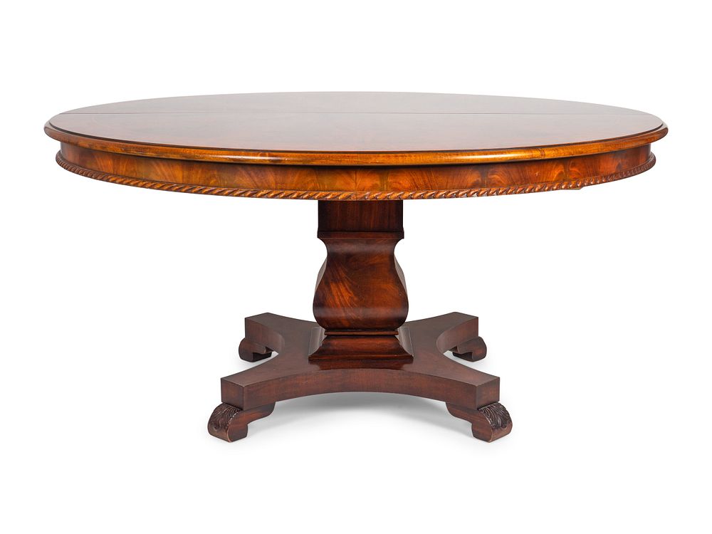 Appraisal: An Empire Style Figured Mahogany Pedestal Dining Table Height x