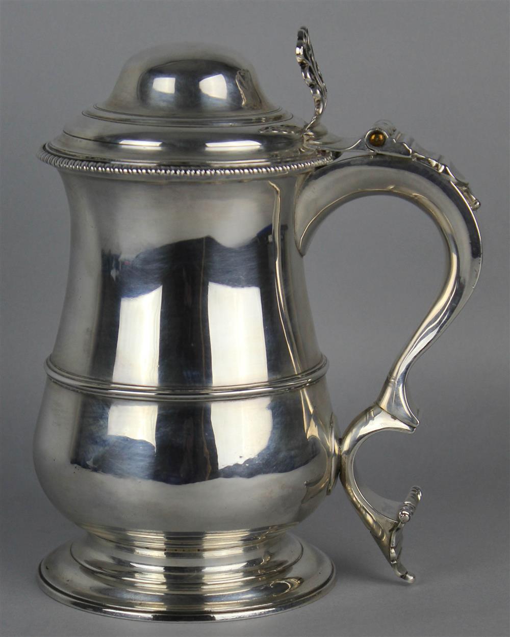 Appraisal: GEORGE III SILVER CRESTED TANKARD London maker's mark of IR