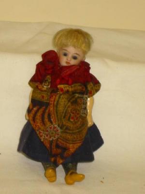 Appraisal: A Kammer Reinhardt bisque doll's house doll with blue glass