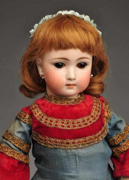 Appraisal: Early German Bisque Child Doll Description Bisque socket head in