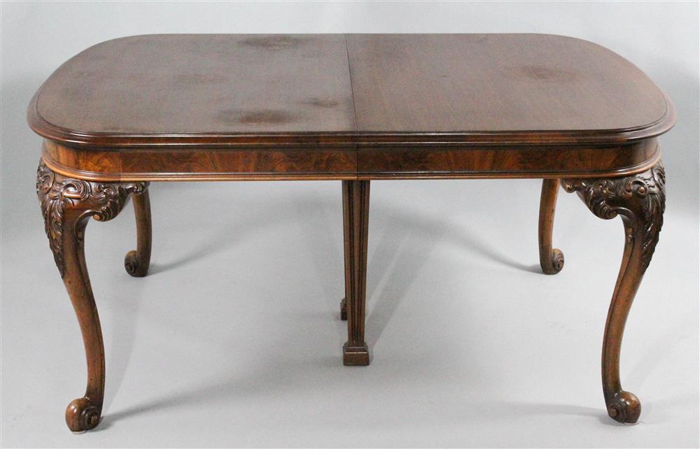 Appraisal: GEORGE II STYLE CARVED MAHOGANY DINING TABLE WITH FIVE LEAVES