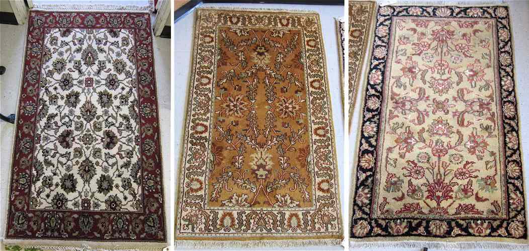 Appraisal: THREE HAND KNOTTED ORIENTAL AREA RUGS Indo-Persians all three in