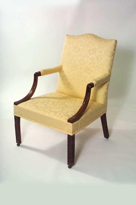 Appraisal: A George III mahogany Gainsborough armchair upholstered in a cream