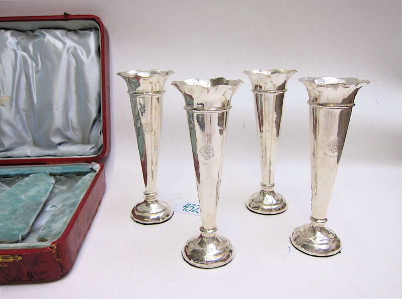 Appraisal: CASED SET ENGLISH STERLING SILVER VASES four pieces trumpet form