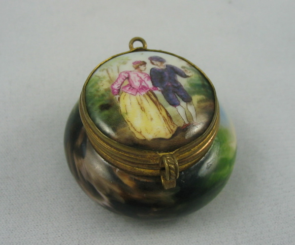 Appraisal: A LIMOGES HAND PAINTED PORCELAIN PATCH BOX of a courting