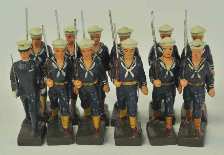 Appraisal: GROUPING OF LINEOL FIGURES US Blue Jackets including marching sailors