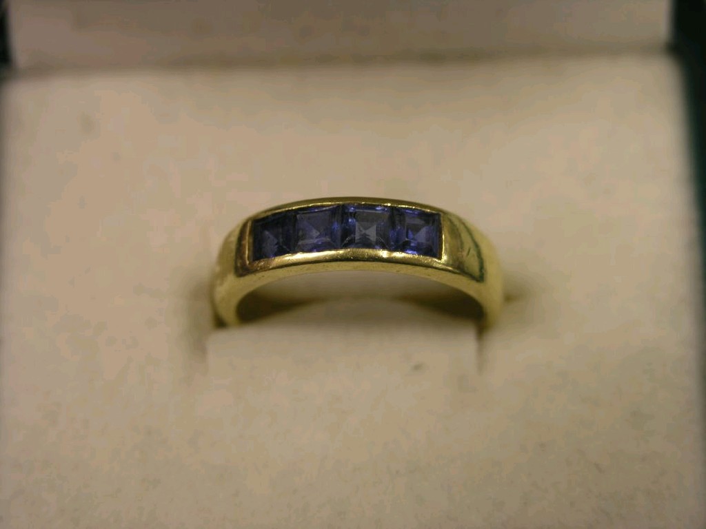 Appraisal: An ct gold and four stone sapphire ring ring size