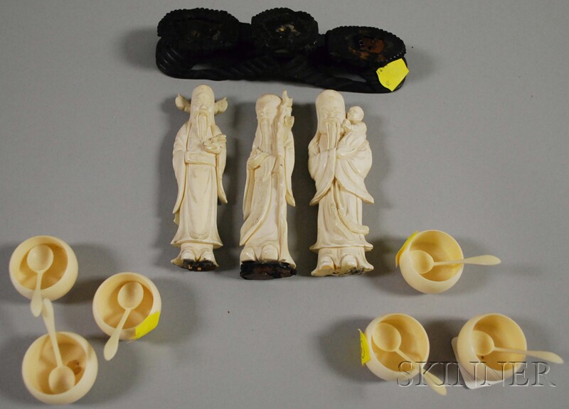 Appraisal: Three Carved Ivory Figures of Immortals and a Set of