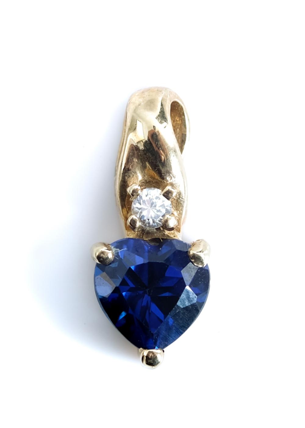 Appraisal: K YELLOW GOLD SAPPHIRE DIAMOND PENDANT k yellow gold pendant