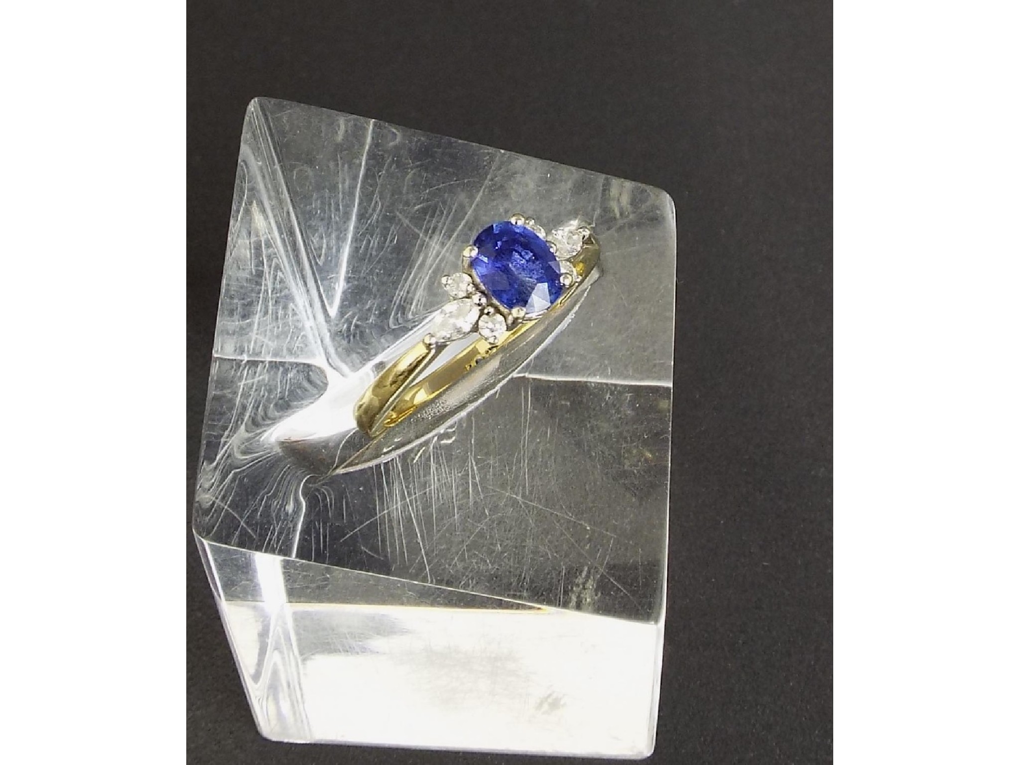 Appraisal: ct sapphire and diamond ring with an oval cut sapphire