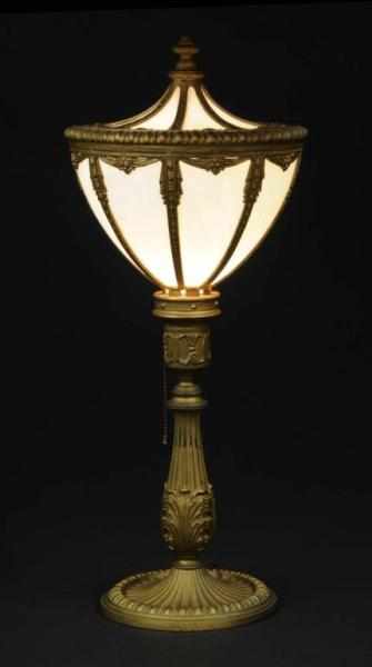 Appraisal: Victorian Lamp Description Brass base with glass shade Condition Excellent